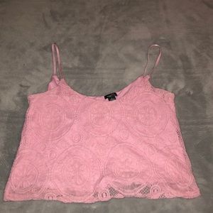 A cute and fun pink and lacey crop top from Rue21.